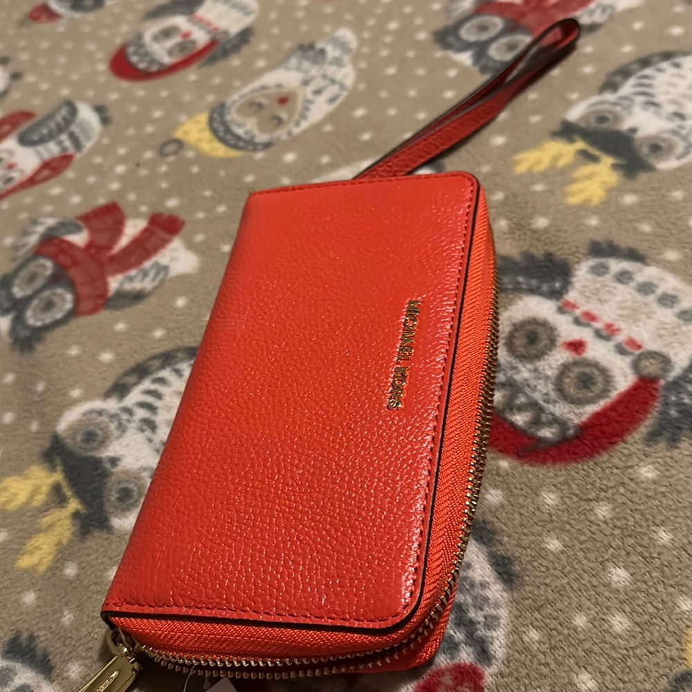 Mk women’s wristlets wallet.